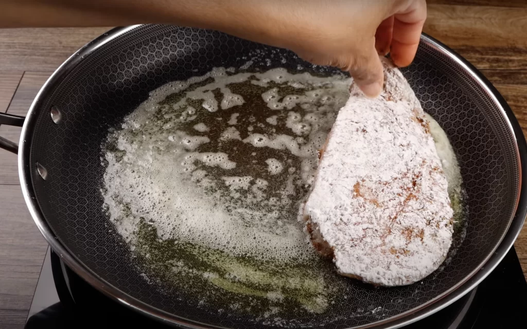 frying the  chicken